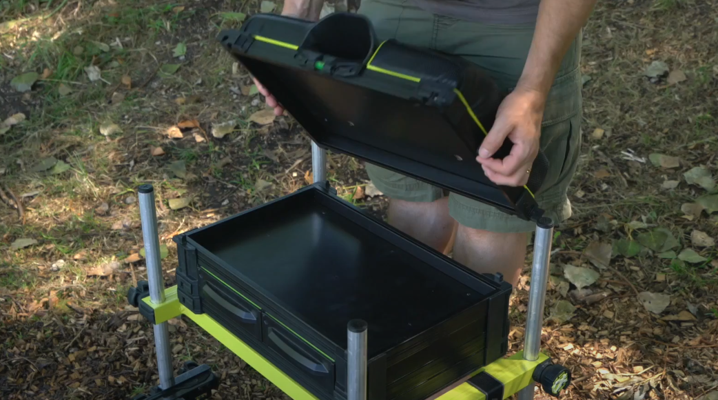 Photo of the Matrix P25 padded seat being removed to reveal storage